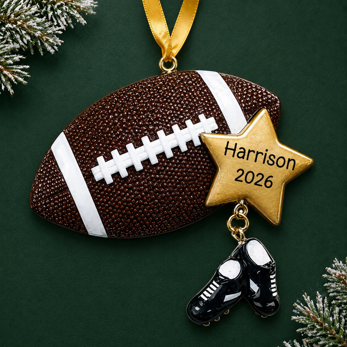 Personalized football star christmas ornament on a dark green pine background