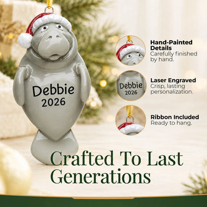Hand-painted details and laser engraved personalization on the manatee christmas ornament, ribbon included
