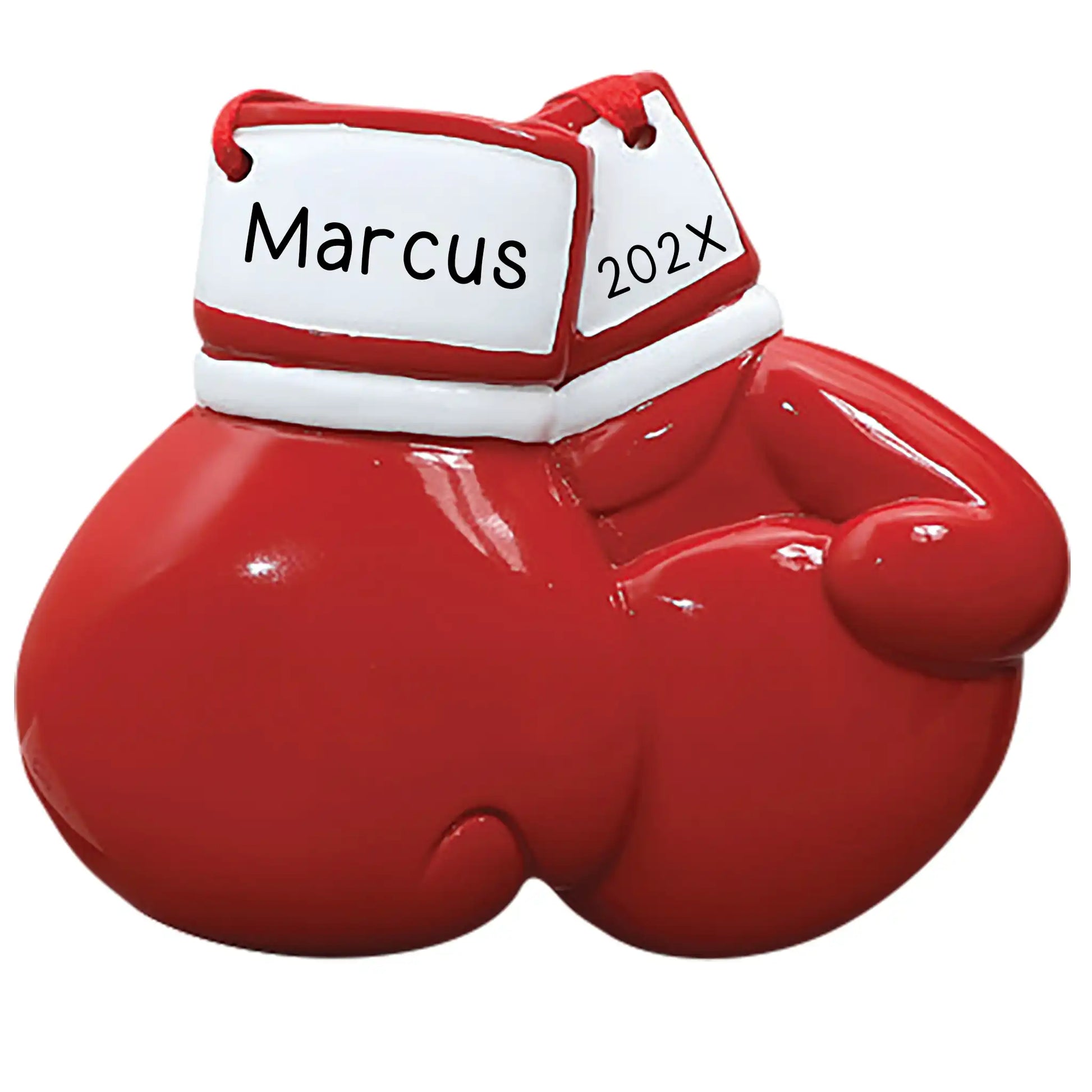 A red and white boxing glove-shaped ornament with the name 'MARCUS YEAR' inscribed on the front.