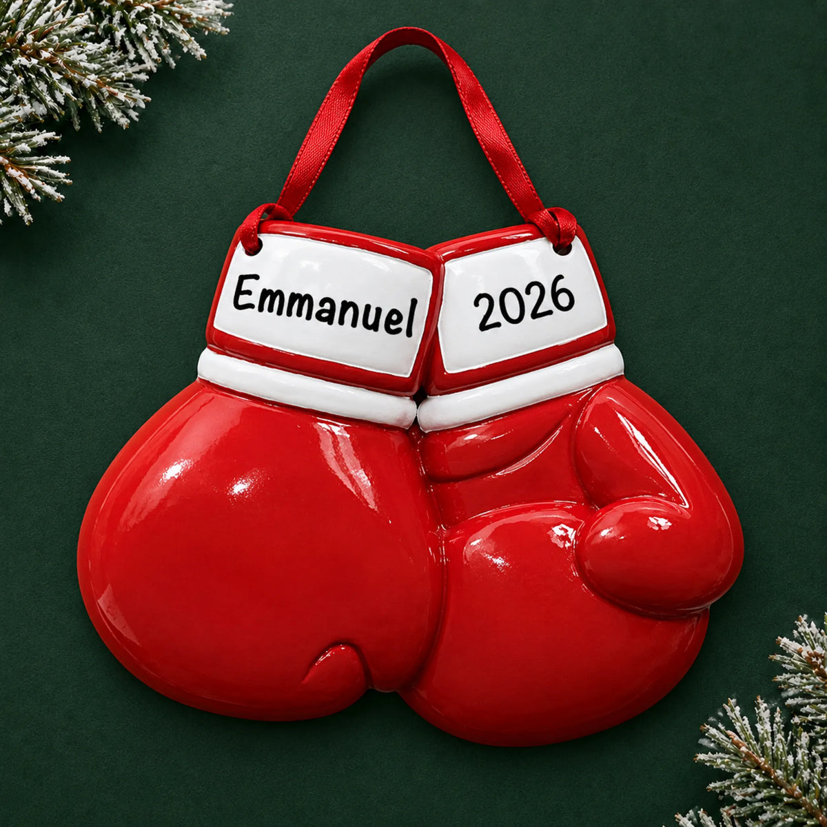 Personalized boxing gloves christmas ornament on a dark green pine background