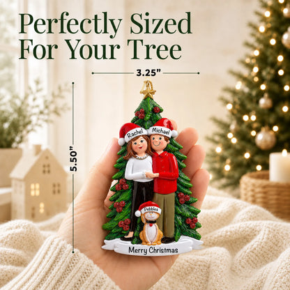 Size guide: the personalized couple with cat christmas ornament is 3.25 in wide by 5.50 in tall, shown in hand