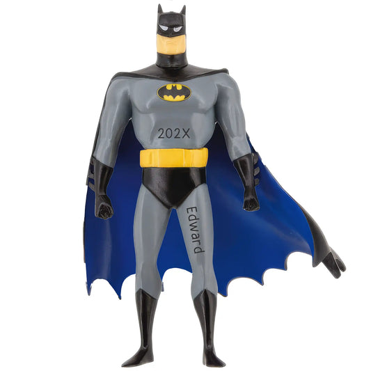 Personalized Batman Christmas ornament featuring the Dark Knight in his gray suit with a black cape and yellow utility belt, customized with a name and year for a bold superhero keepsake.