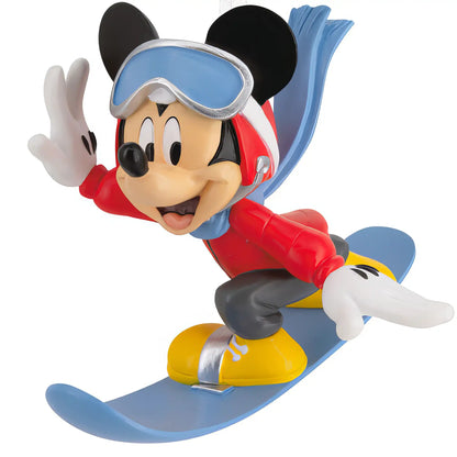 A personalized Disney Mickey Mouse ornament carving a path on a blue snowboard, ready for a name and year on the surface.