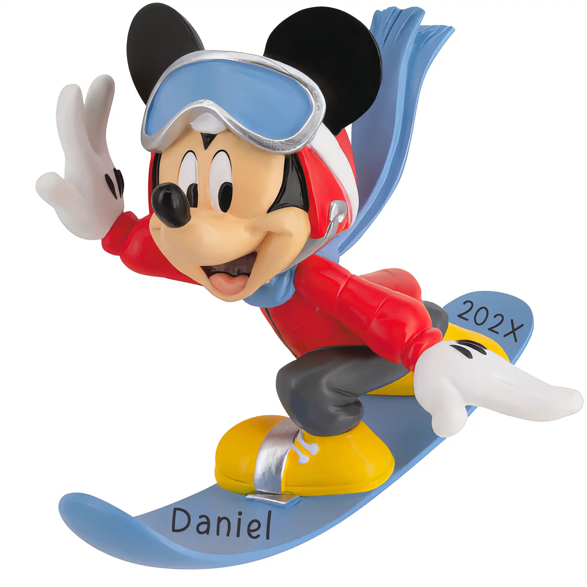 A personalized Disney Mickey Mouse ornament carving a path on a blue snowboard, ready for a name and year on the surface.