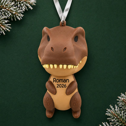 Personalized brown t-rex dinosaur christmas ornament on a dark green pine background