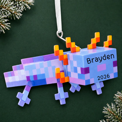 Personalized pixel video game axolotl christmas ornament on a dark green pine background