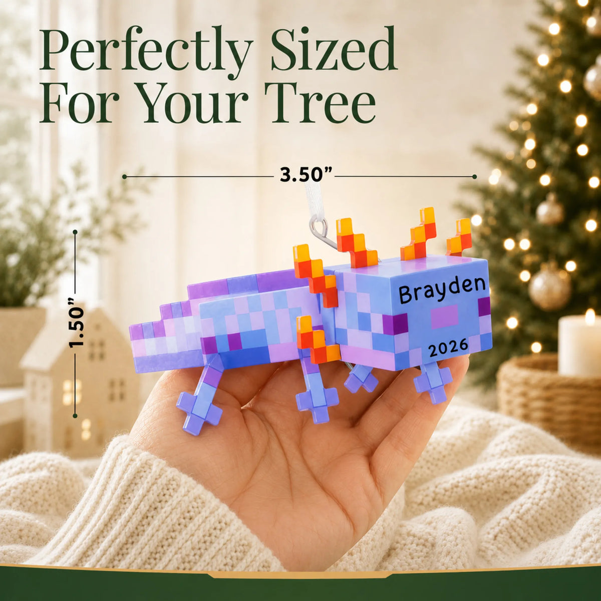 Size guide: the personalized pixel video game axolotl christmas ornament is 3.50 in wide by 1.50 in tall, shown in hand