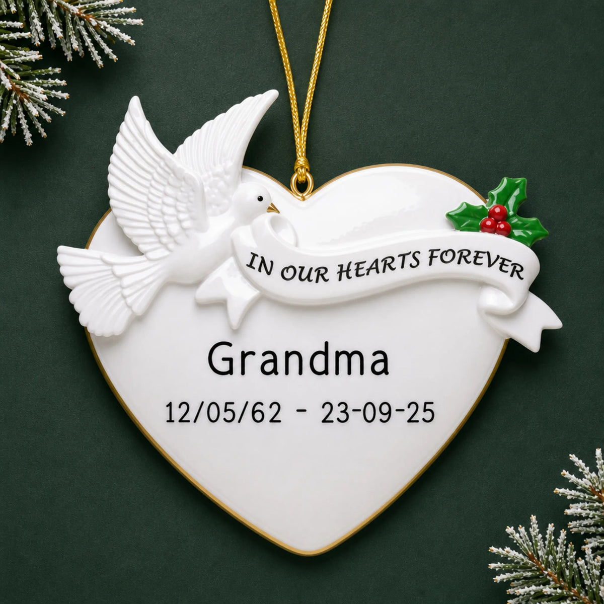 Personalized Memorial Dove Heart christmas ornament on a dark green pine background