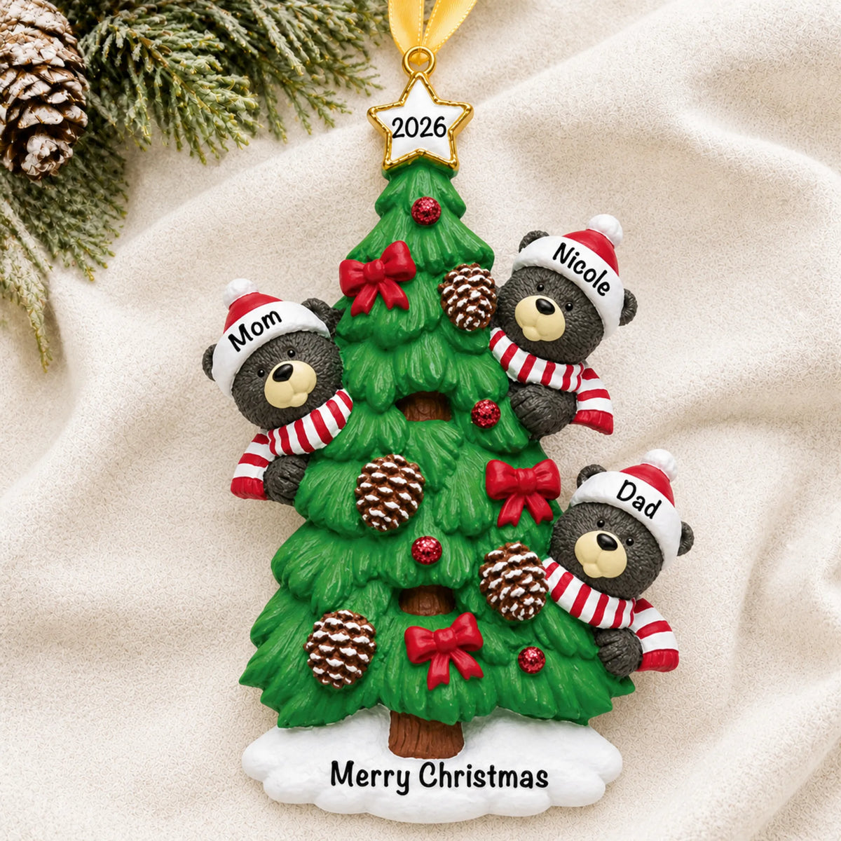 Personalized black bear tree family of 3 christmas ornament laid on a soft white knit blanket