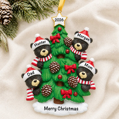 Personalized black bear tree family of 4 christmas ornament laid on a soft white knit blanket