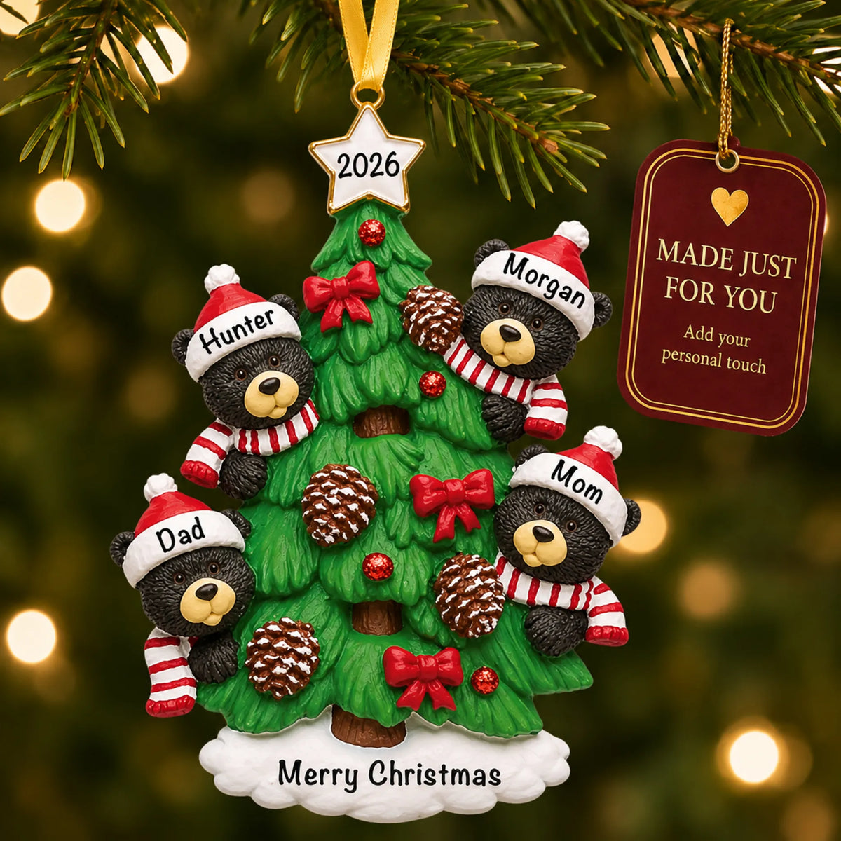 Black bear tree family of 4 christmas ornament hanging on a lit Christmas tree with a Made Just For You gift tag