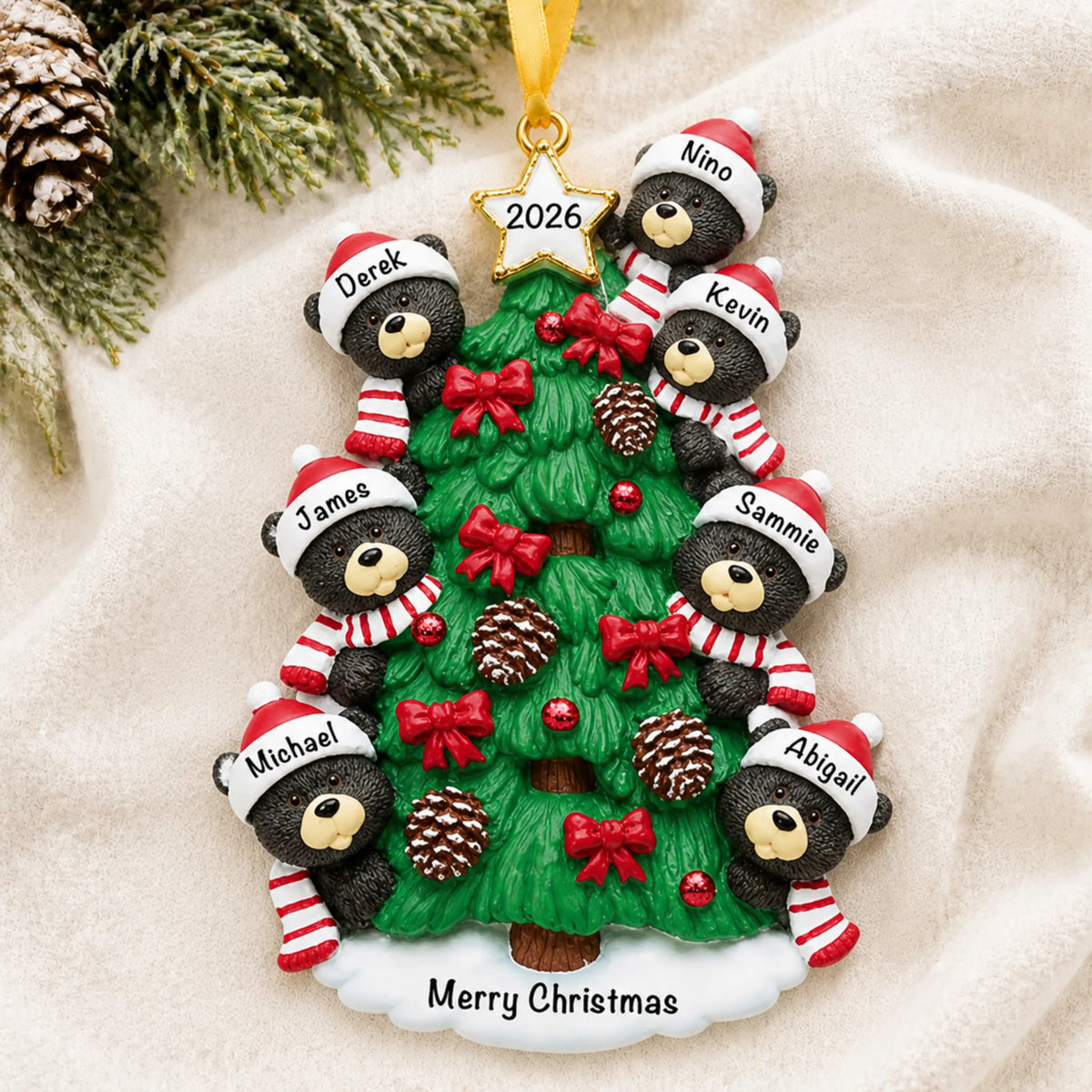 Personalized black bear tree family of 7 christmas ornament laid on a soft white knit blanket