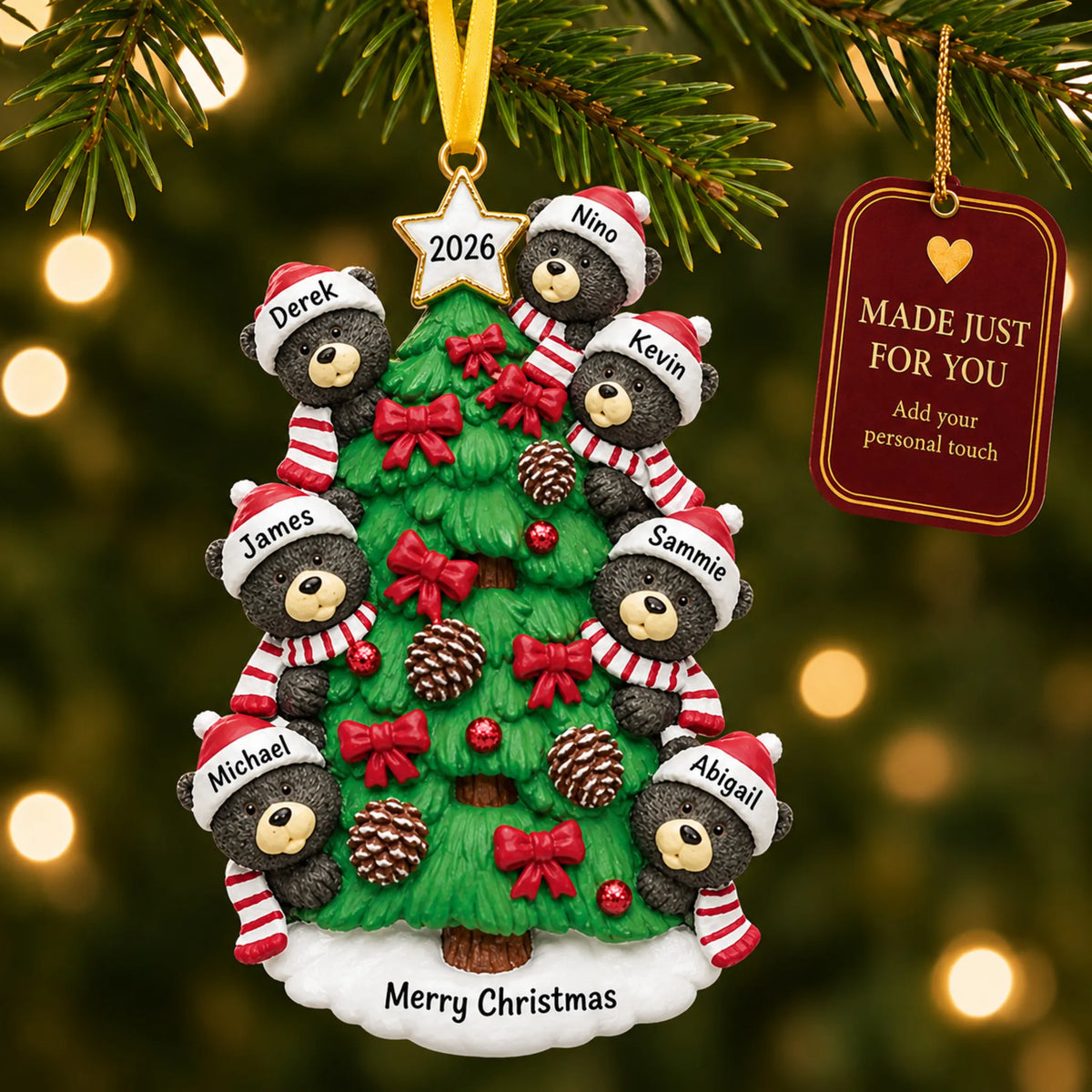 Black bear tree family of 7 christmas ornament hanging on a lit Christmas tree with a Made Just For You gift tag
