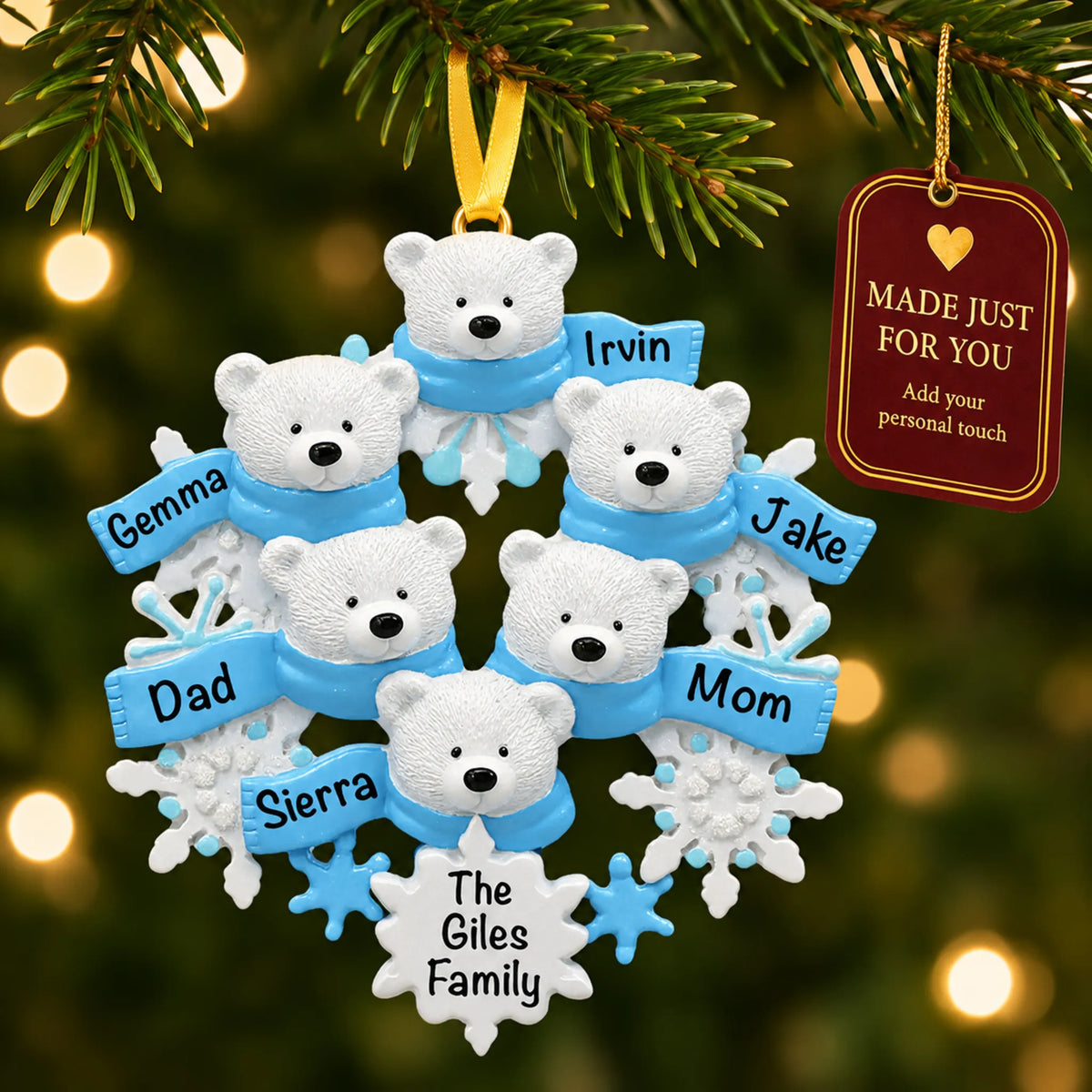 Polar bear family of 6 christmas ornament hanging on a lit Christmas tree with a Made Just For You gift tag