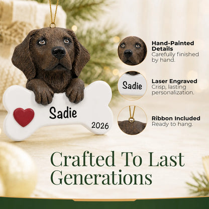 Close-up of the personalized chocolate Lab dog bone Christmas ornament showing hand-painted details and laser engraving