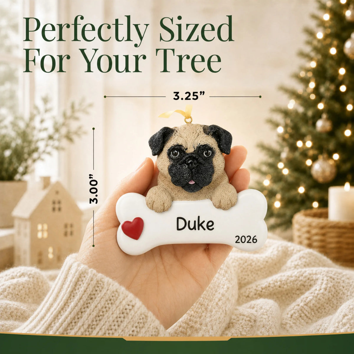 Hand holding the personalized pug Christmas ornament to show its 3.25 by 3 inch size