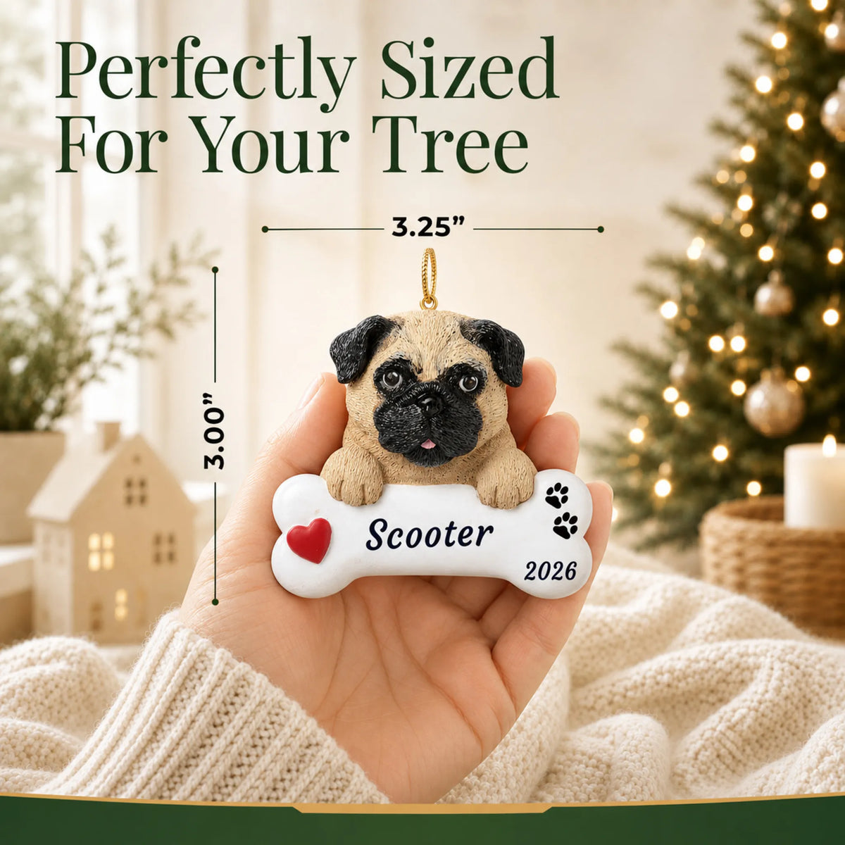 Hand holding the personalized pug Christmas ornament to show its 3.25 by 3 inch size