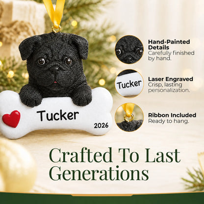 Close-up of the personalized black pug Christmas ornament showing hand-painted details and laser engraving
