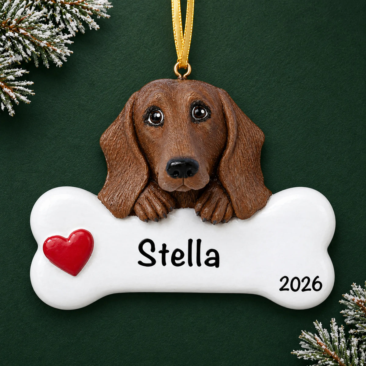 Personalized dachshund dog bone Christmas ornament, engraved with a name and year, on a green holiday backdrop