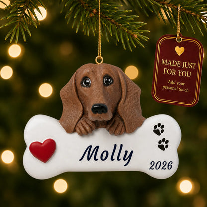 Dachshund Dog Bone christmas ornament hanging on a lit Christmas tree with a Made Just For You gift tag