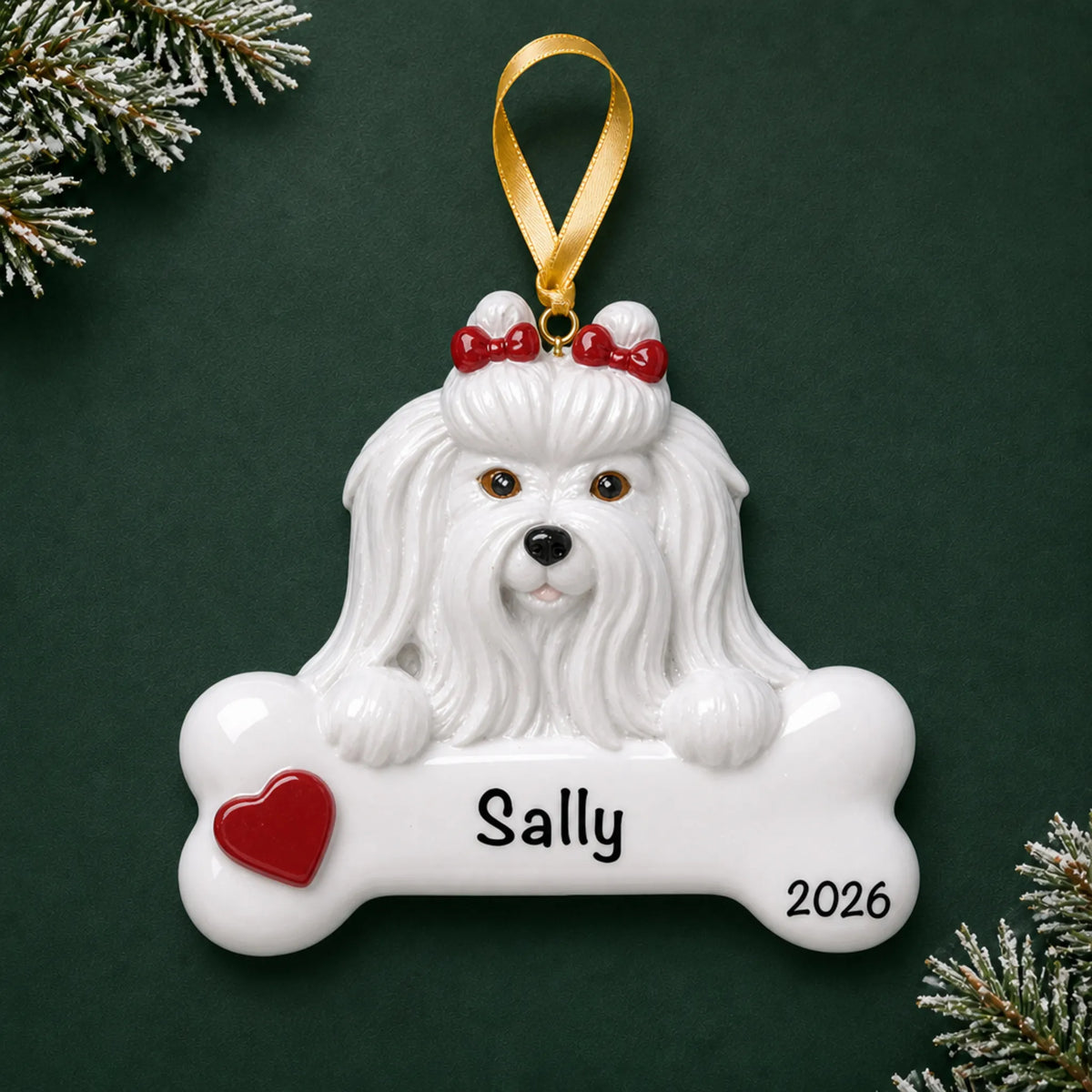 Personalized Maltese dog bone Christmas ornament, engraved with a name and year, on a green holiday backdrop