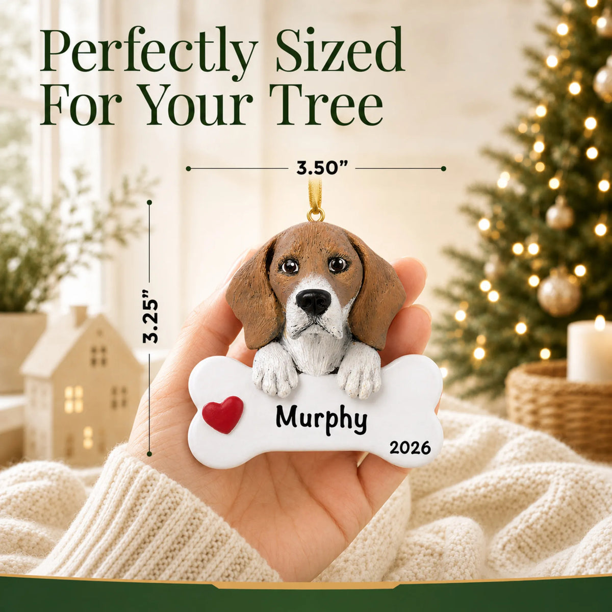 Hand holding the personalized beagle Christmas ornament to show its 3.50 inch width