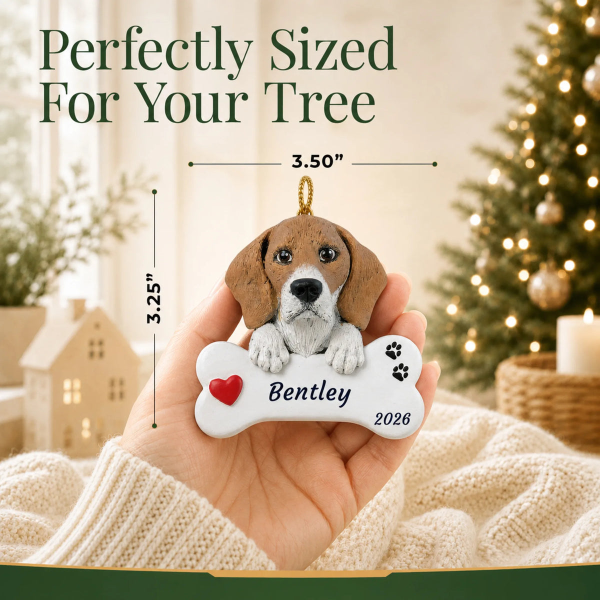 Size guide: the personalized Beagle Dog Bone christmas ornament is 3.50 in wide by 3.25 in tall, shown in hand