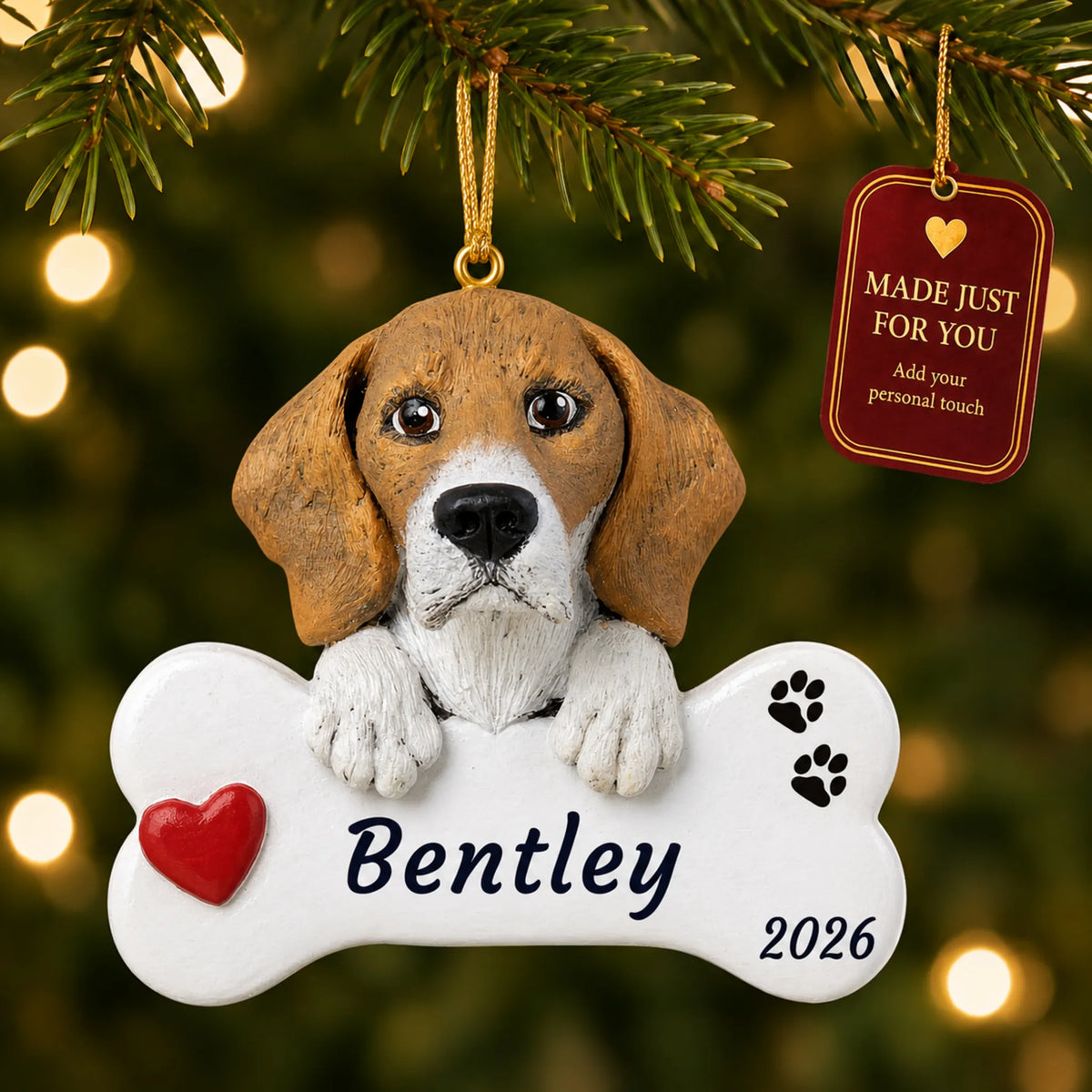 Beagle Dog Bone christmas ornament hanging on a lit Christmas tree with a Made Just For You gift tag