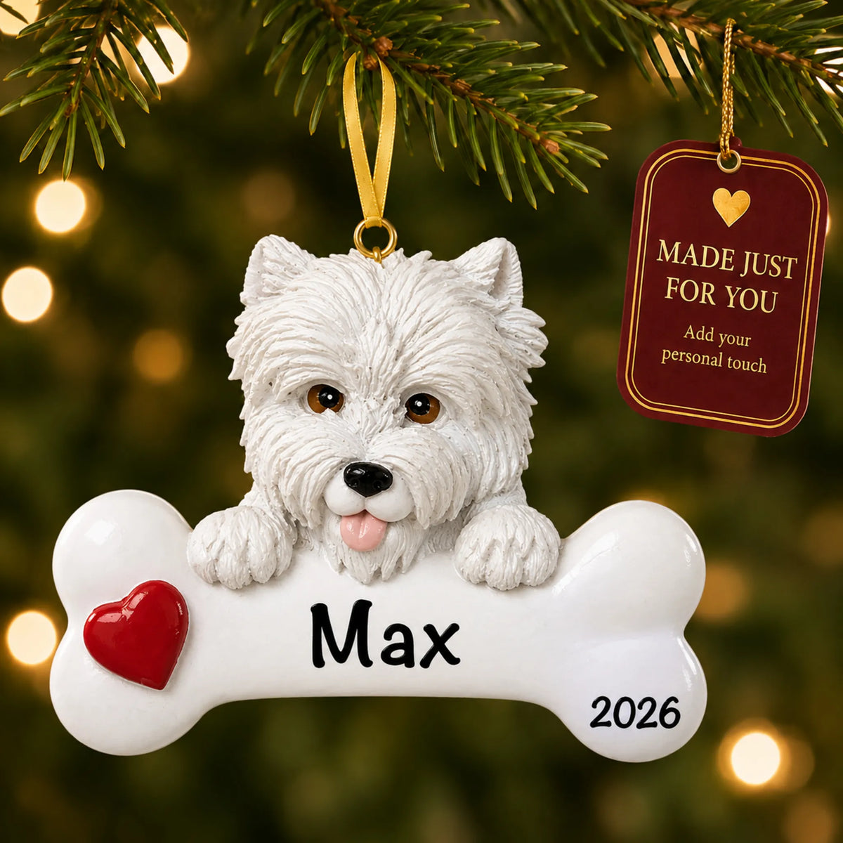 Personalized Westie Christmas ornament hanging on a lit tree beside a Made Just For You tag
