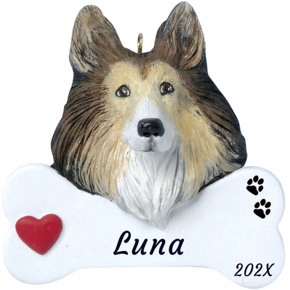 Personalized collie dog bone Christmas ornament, a sable and white collie on a white bone, red heart, name and year