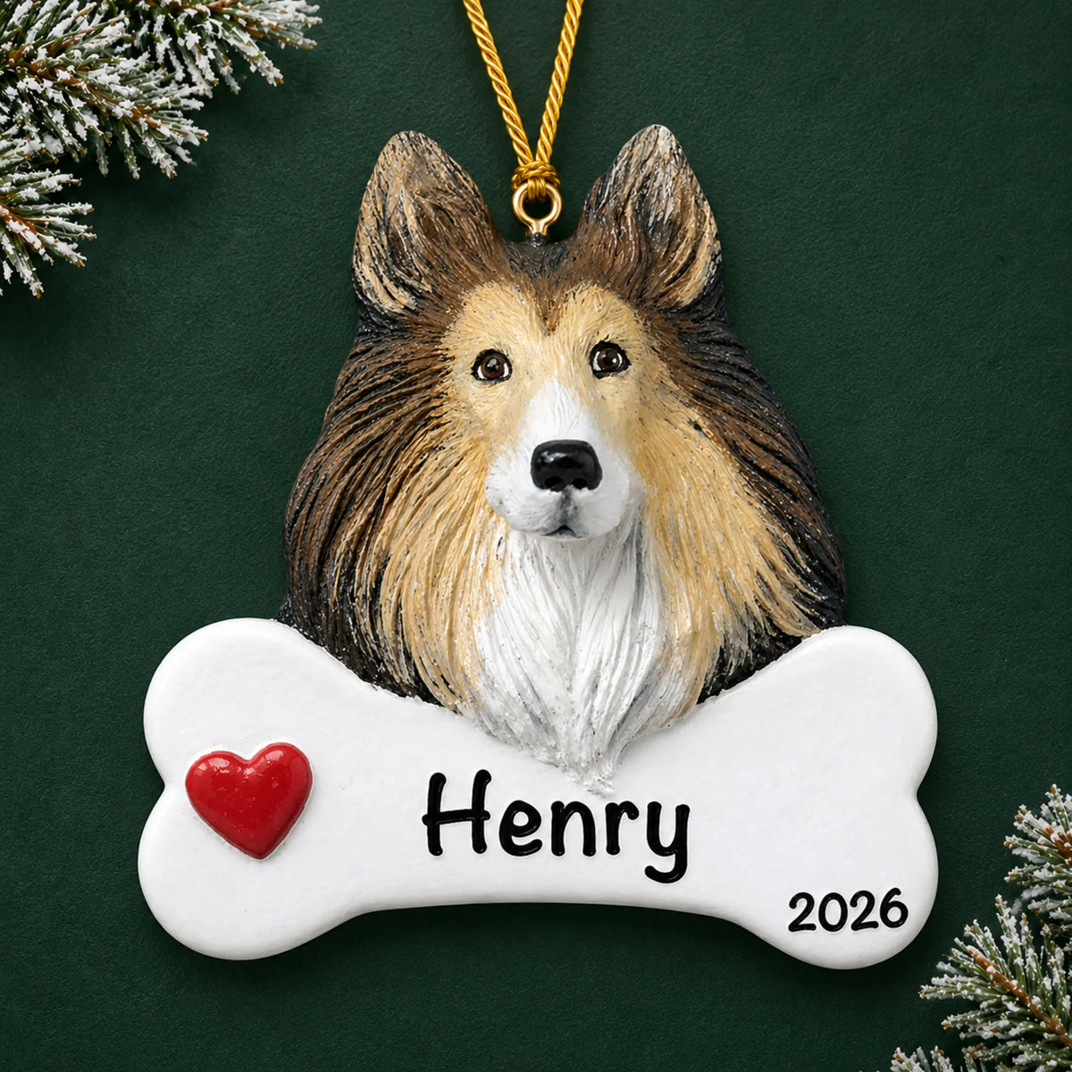 Personalized collie dog bone Christmas ornament, engraved with a name and year, on a green holiday backdrop