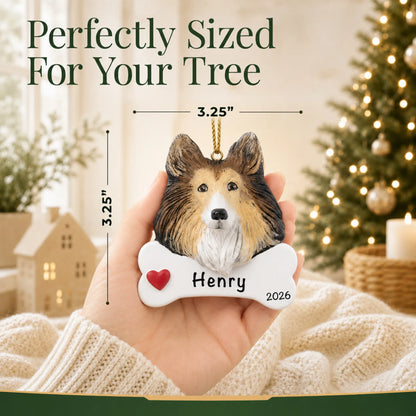 Hand holding the personalized collie Christmas ornament to show its 3.25 inch width
