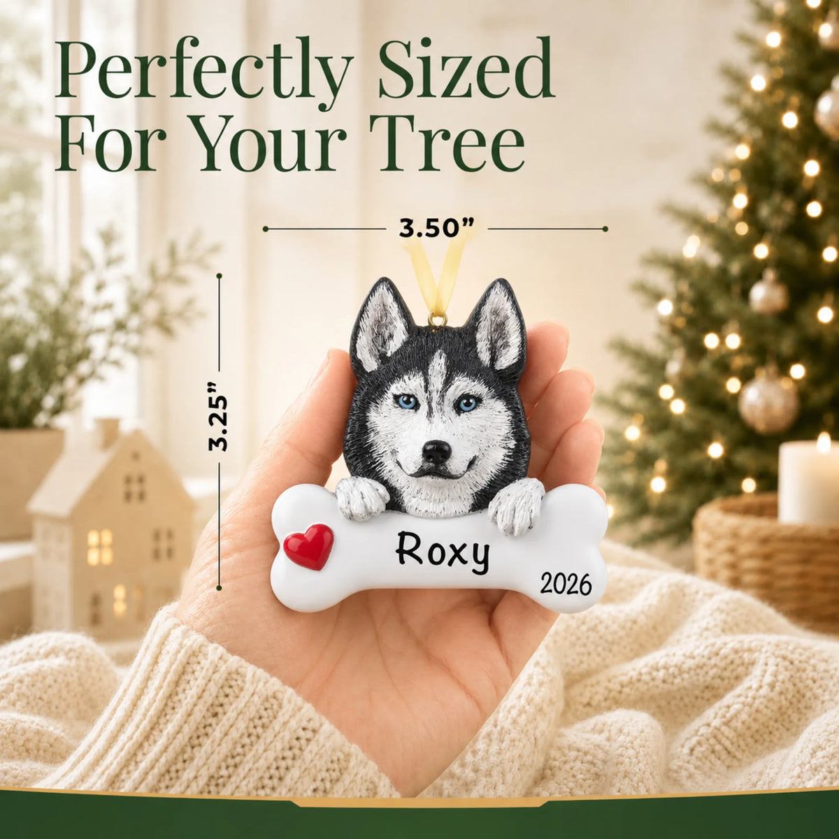 Hand holding the personalized Siberian husky Christmas ornament to show its 3.50 inch width