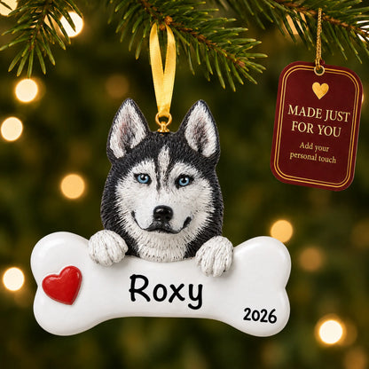 Personalized Siberian husky Christmas ornament hanging on a lit tree beside a Made Just For You tag