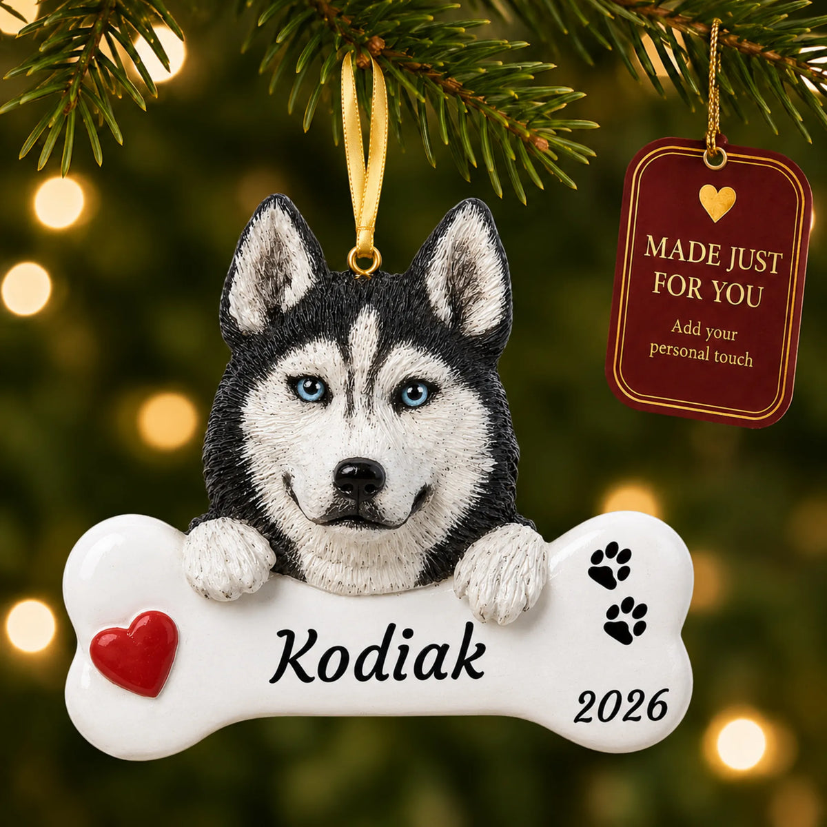 Personalized Siberian husky Christmas ornament hanging on a lit tree beside a Made Just For You tag