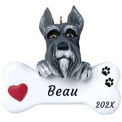 Personalized schnauzer dog bone Christmas ornament, a salt and pepper schnauzer on a white bone, red heart, name and year