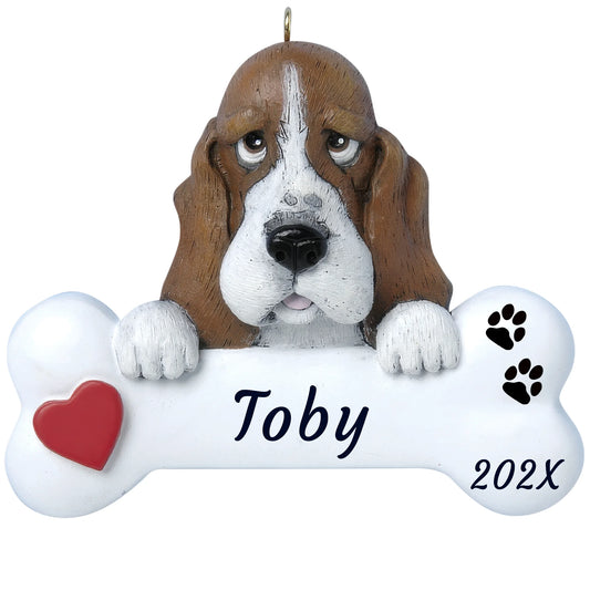Personalized basset hound dog bone Christmas ornament, a droopy-eared basset on a white bone, red heart, name and year