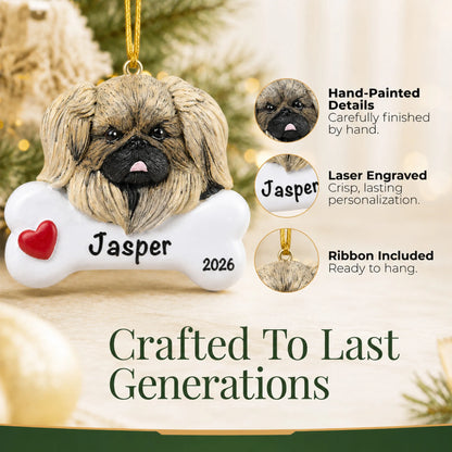 Close-up of the personalized Pekingese Christmas ornament showing hand-painted details and laser engraving