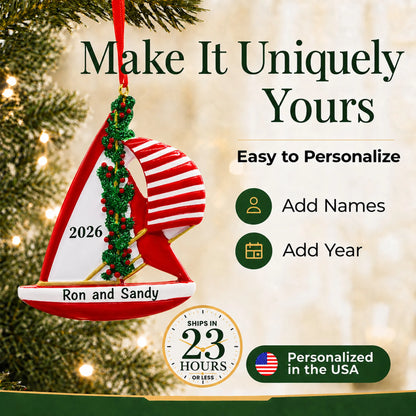 Make it yours: add names and year to the personalized red sailboat christmas ornament