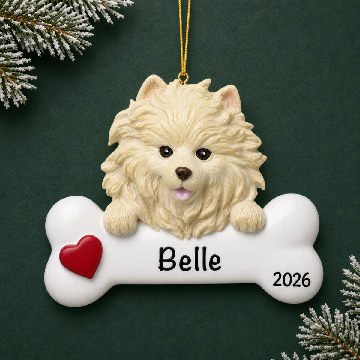Personalized Pomeranian dog bone Christmas ornament, engraved with a name and year, on a green holiday backdrop