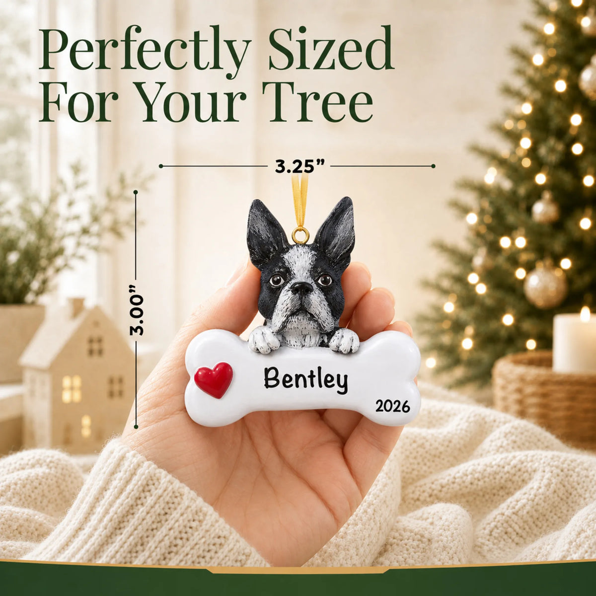 Hand holding the personalized Boston terrier Christmas ornament to show its 3.25 inch width