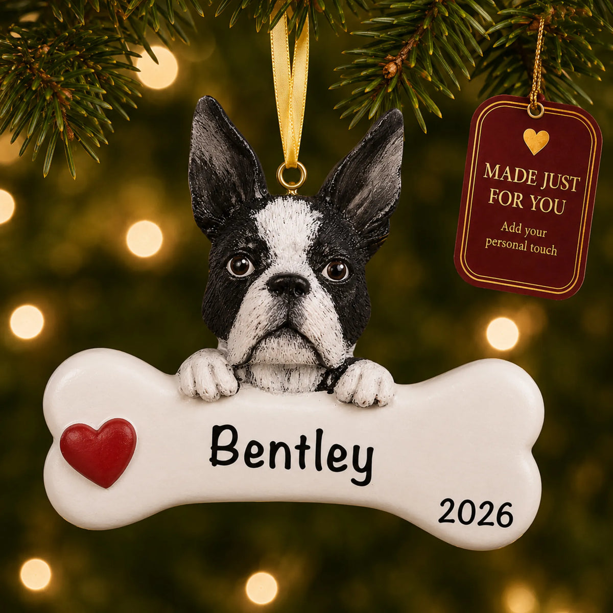 Personalized Boston terrier Christmas ornament hanging on a lit tree beside a Made Just For You tag