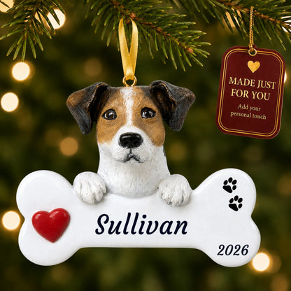 Jack Russell Dog Bone christmas ornament hanging on a lit Christmas tree with a Made Just For You gift tag