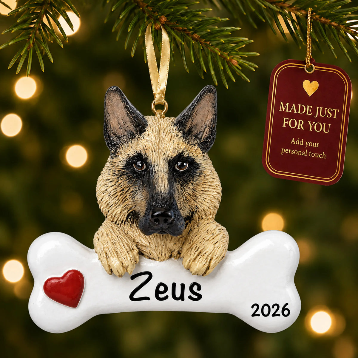 Personalized German shepherd Christmas ornament hanging on a lit tree beside a Made Just For You tag