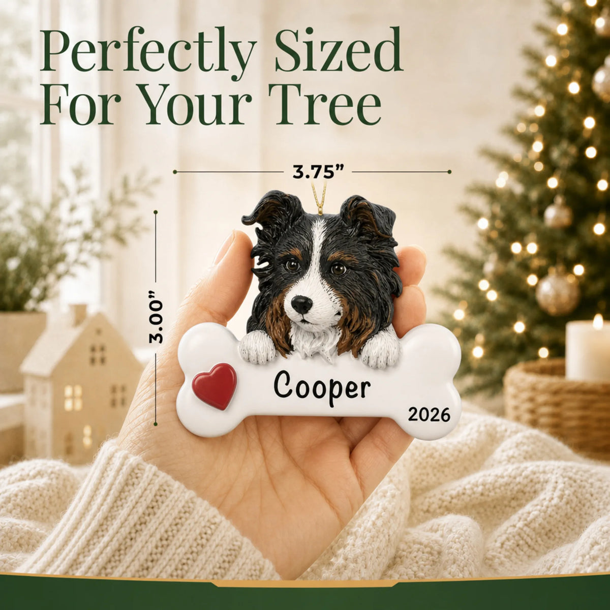 Hand holding the personalized Australian shepherd Christmas ornament to show its 3.75 inch width