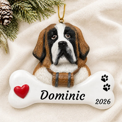Personalized St. Bernard Dog Bone christmas ornament laid on a soft white knit blanket