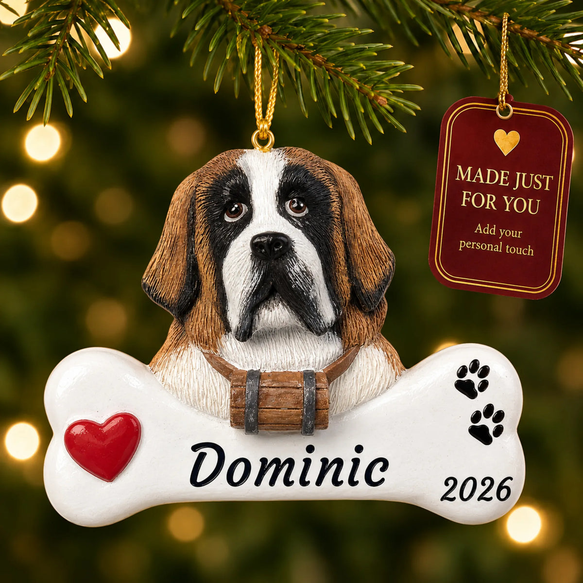St. Bernard Dog Bone christmas ornament hanging on a lit Christmas tree with a Made Just For You gift tag