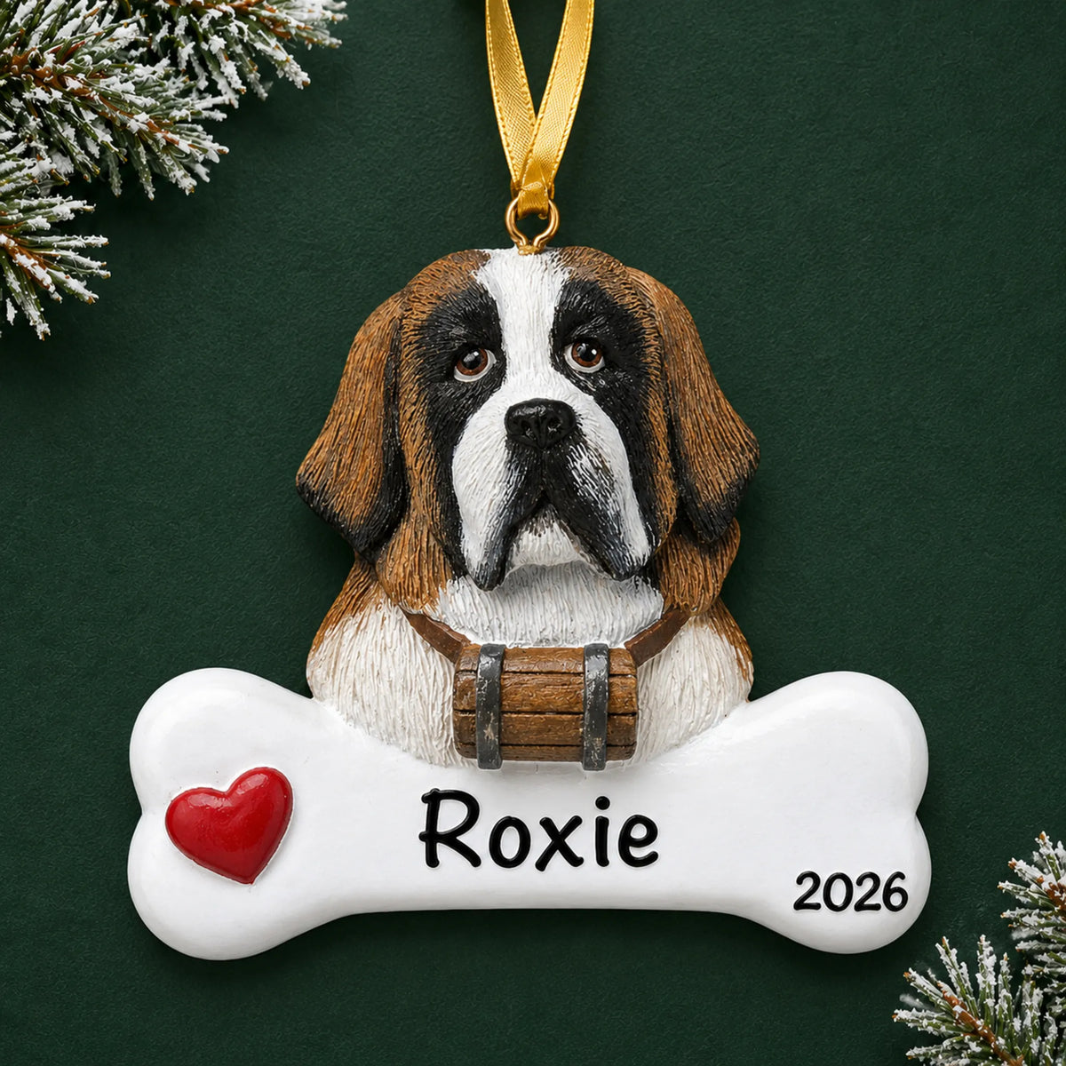 Personalized St. Bernard dog bone Christmas ornament, engraved with a name and year, on a green holiday backdrop