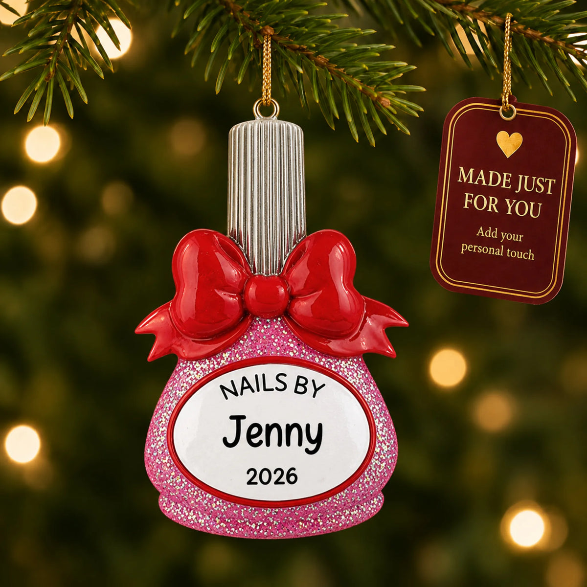 Nail polish bottle nail tech christmas ornament hanging on a lit Christmas tree with a Made Just For You gift tag