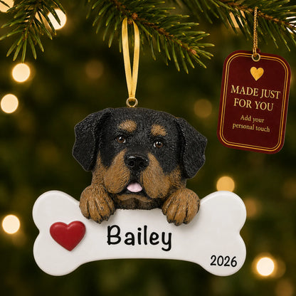 Personalized Rottweiler Christmas ornament hanging on a lit tree beside a Made Just For You tag